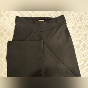 Black slacks. Maurice’s brand size M.